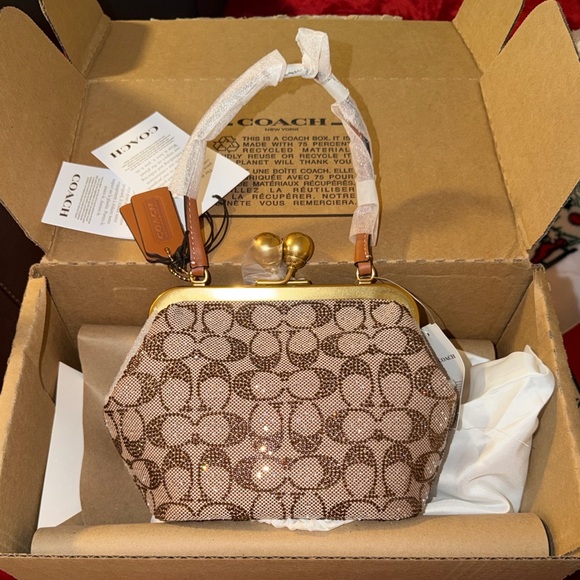 Coach Handbags - Coach Kisslock Frame Bag 16 In Crystal Signature Jacquard